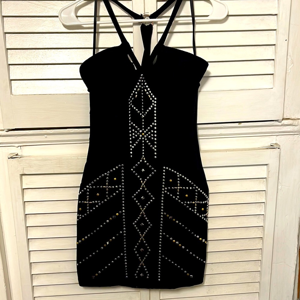 BEBE DRESS SIZE XS. BLACK AWESOME.  SIDE ZIP.  Very flattering!